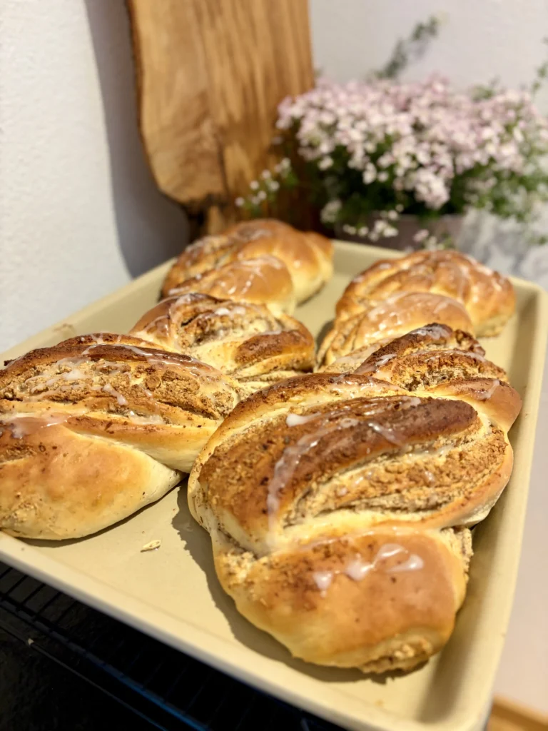 Saftiger Nusszopf mit Hefeteig und Haselnussfüllung, gebacken im Pampered Chef Großen Ofenzauberer plus